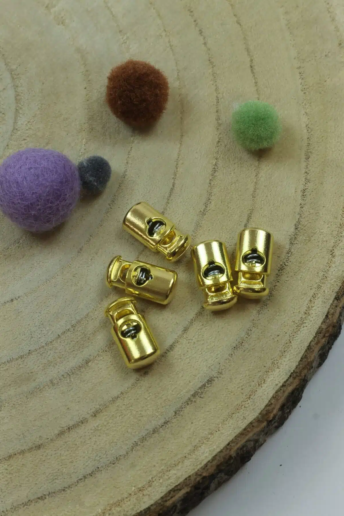 Kordelstopper metallisiert gold
